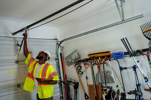 Professional Garage Door Panel Replacement technician working in Conroe, TX